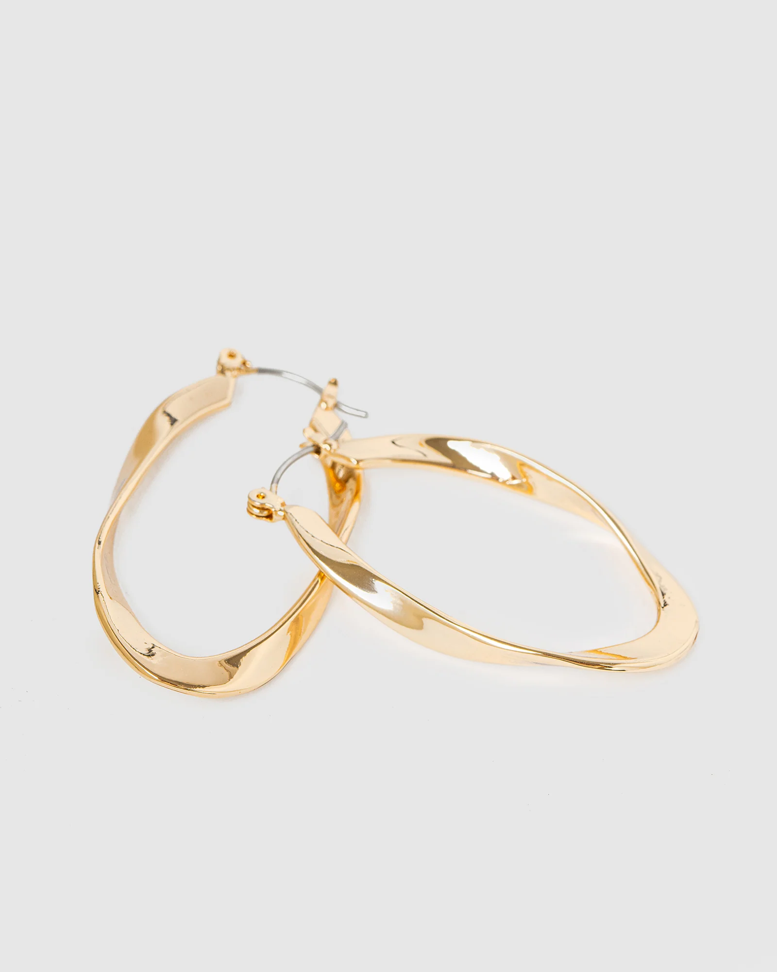 Gold Twisted Wave Hoop Earrings - Image 3